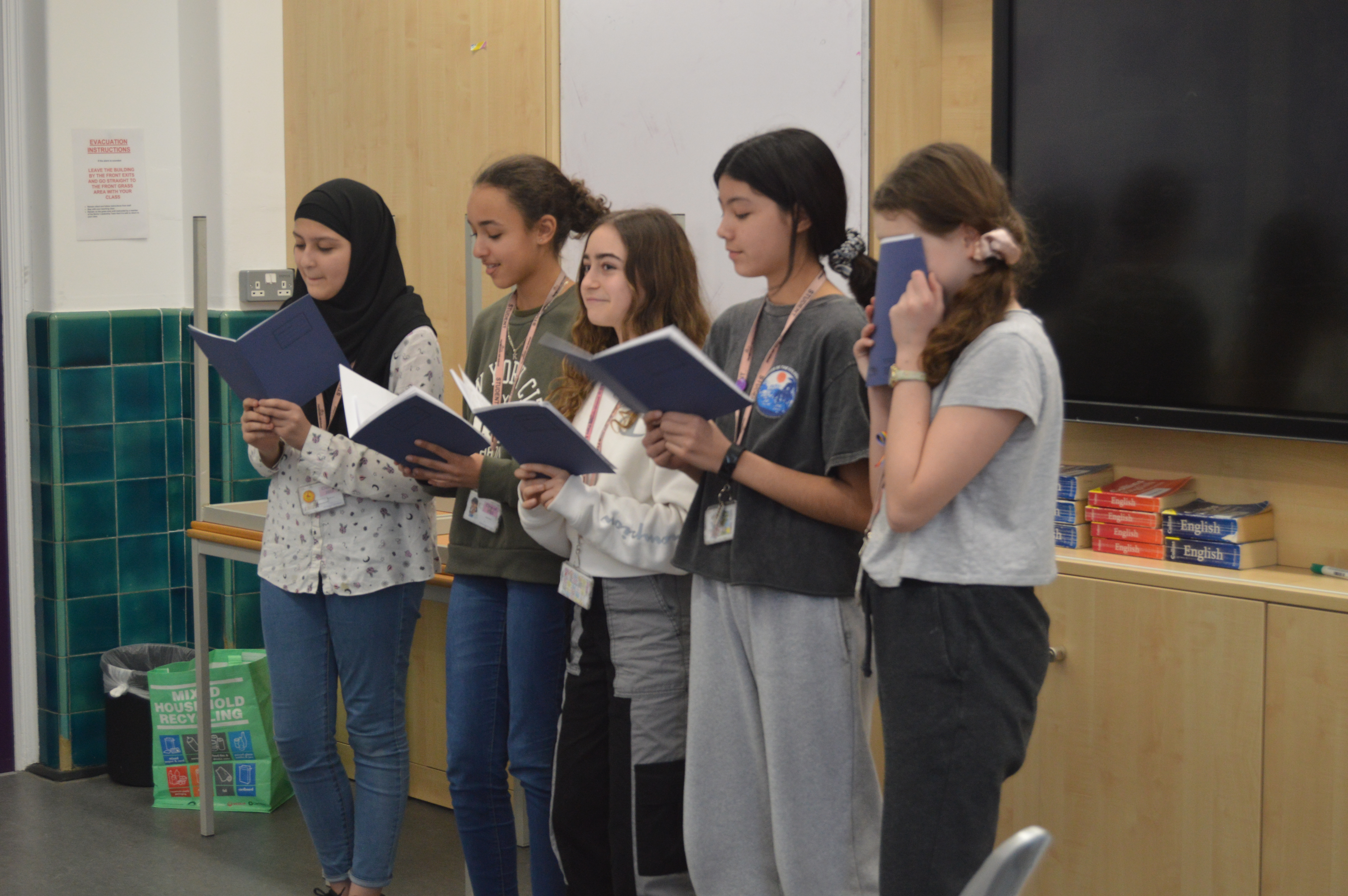 Students performing poetry
