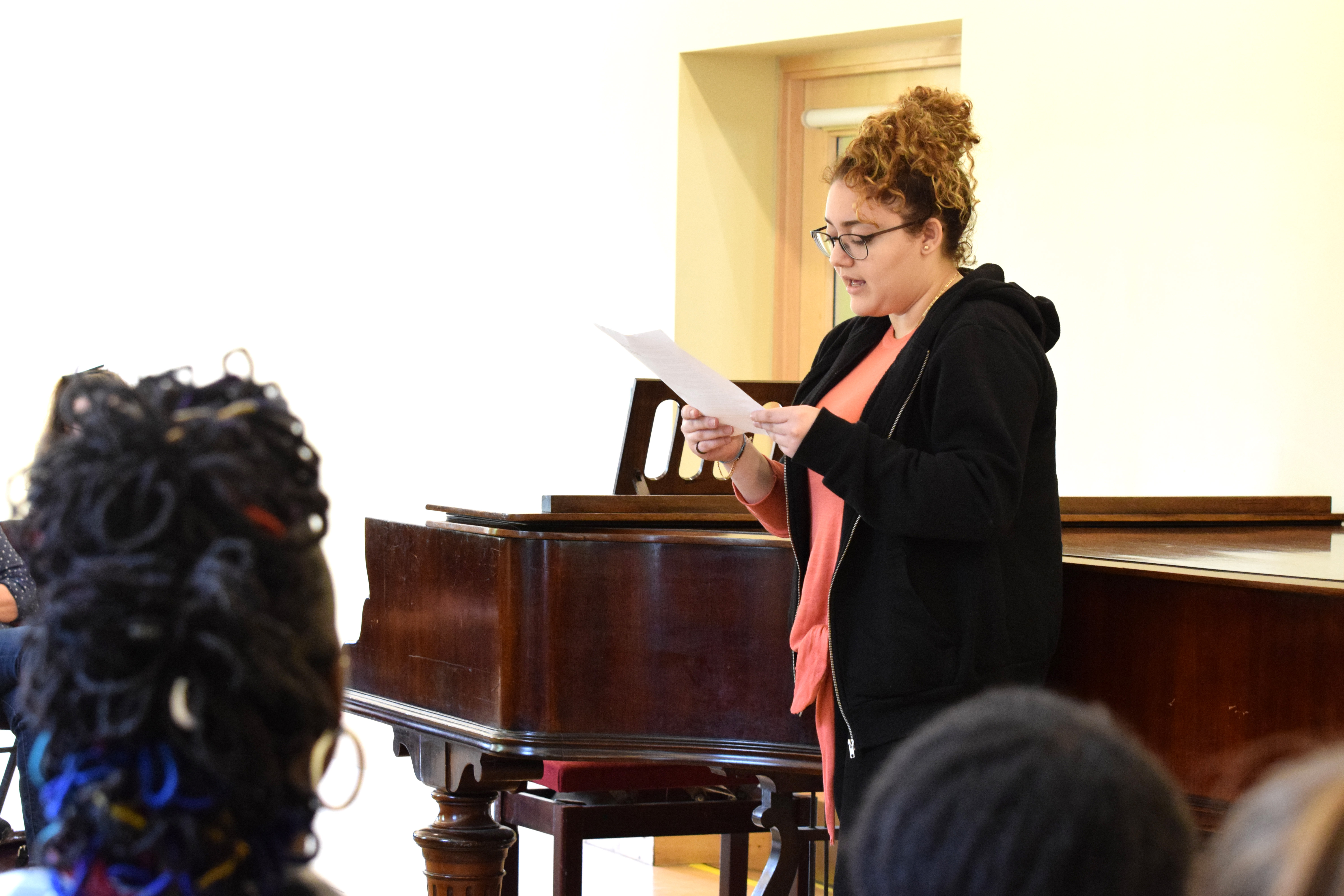 Student performing their poem at Lauderdale House