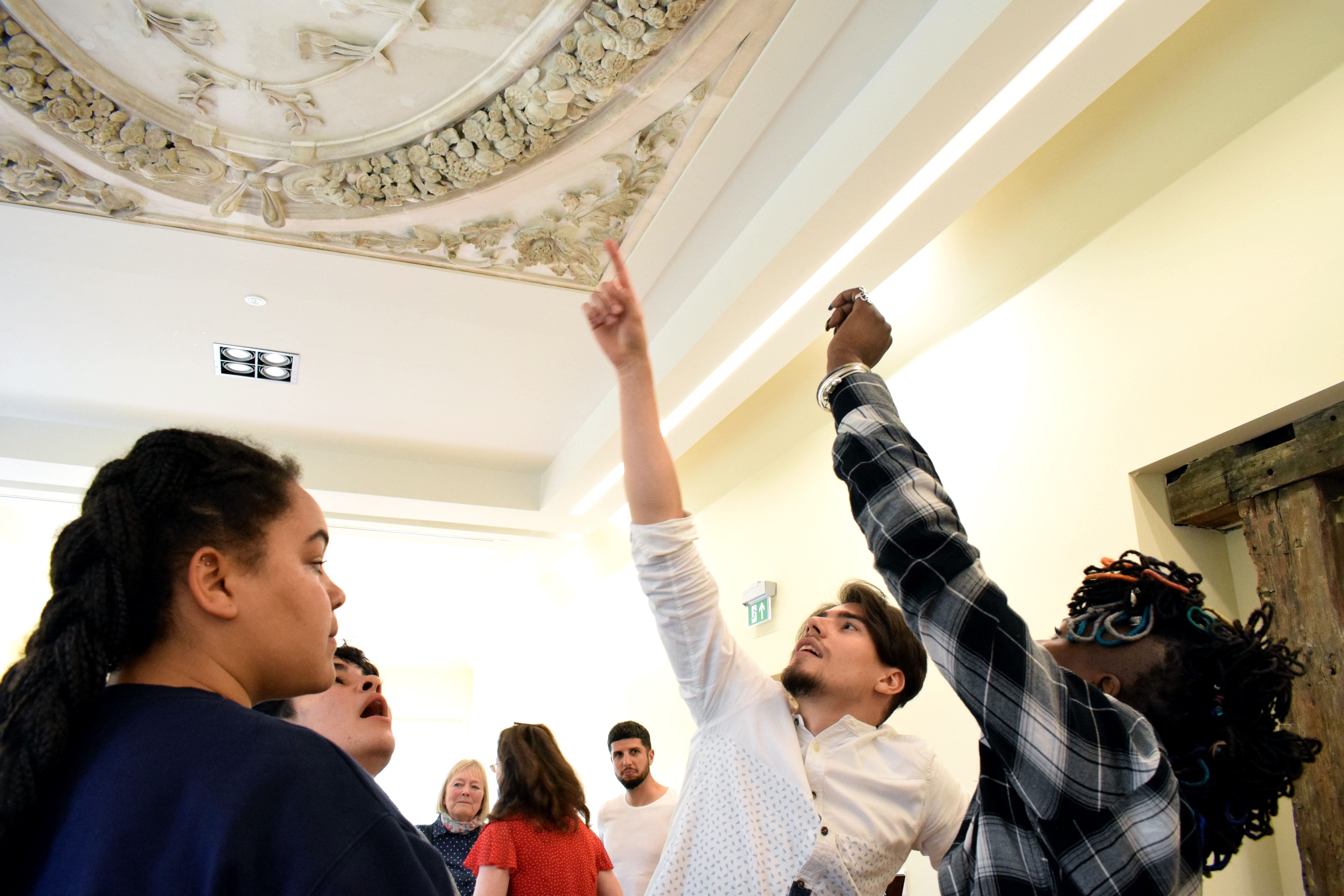 Students looking at Long Gallery ceiling