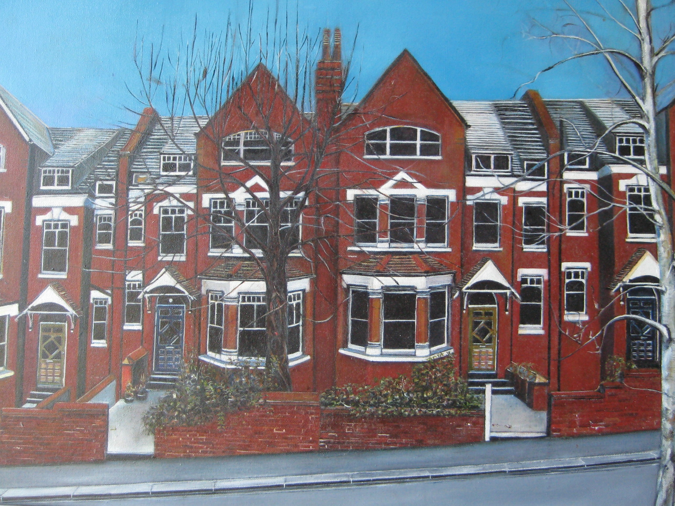 Street scene of red brick buildings