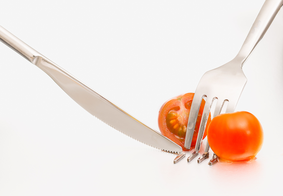 Fork cut with tomato