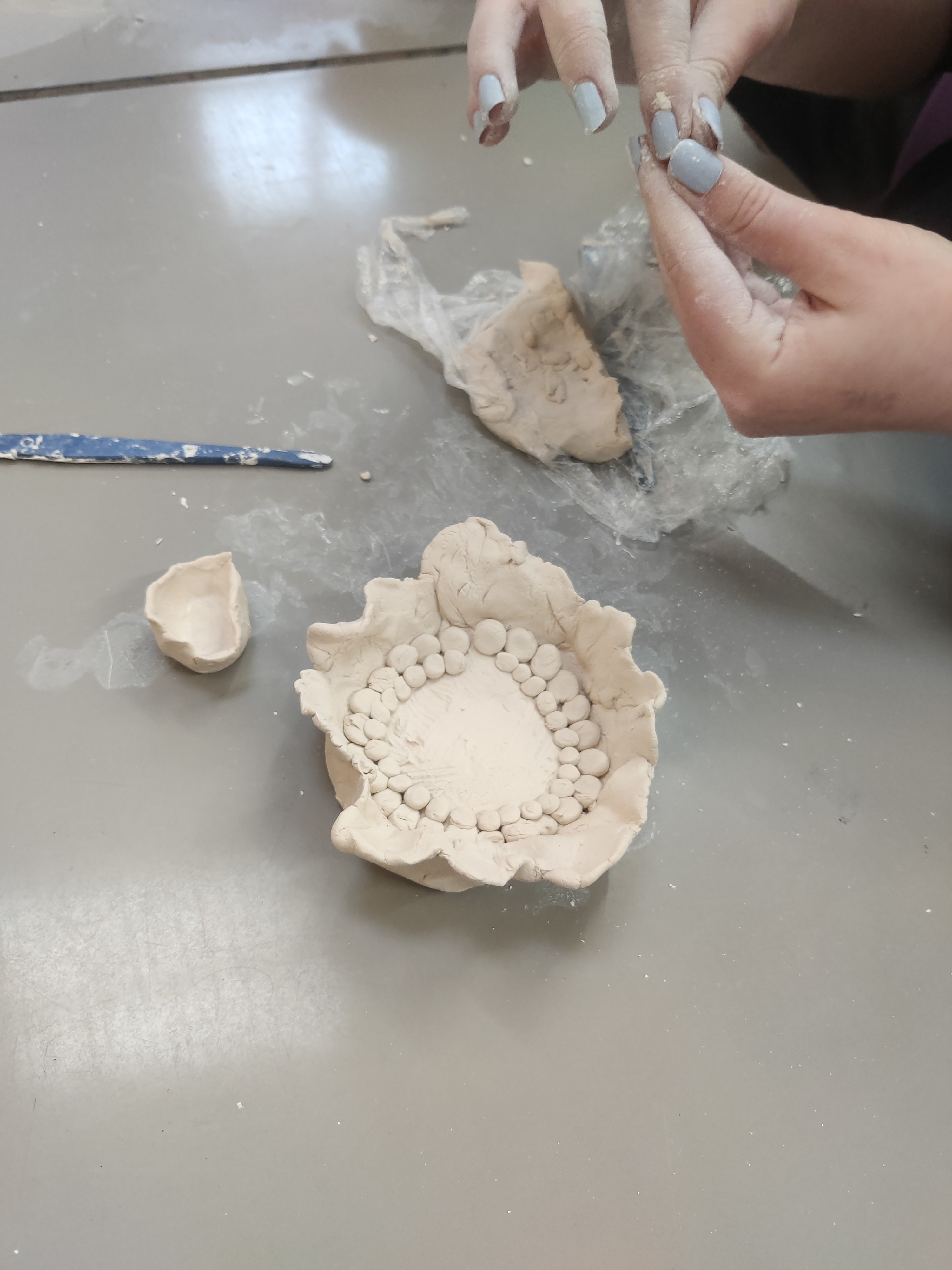 clay sculpture of a flower