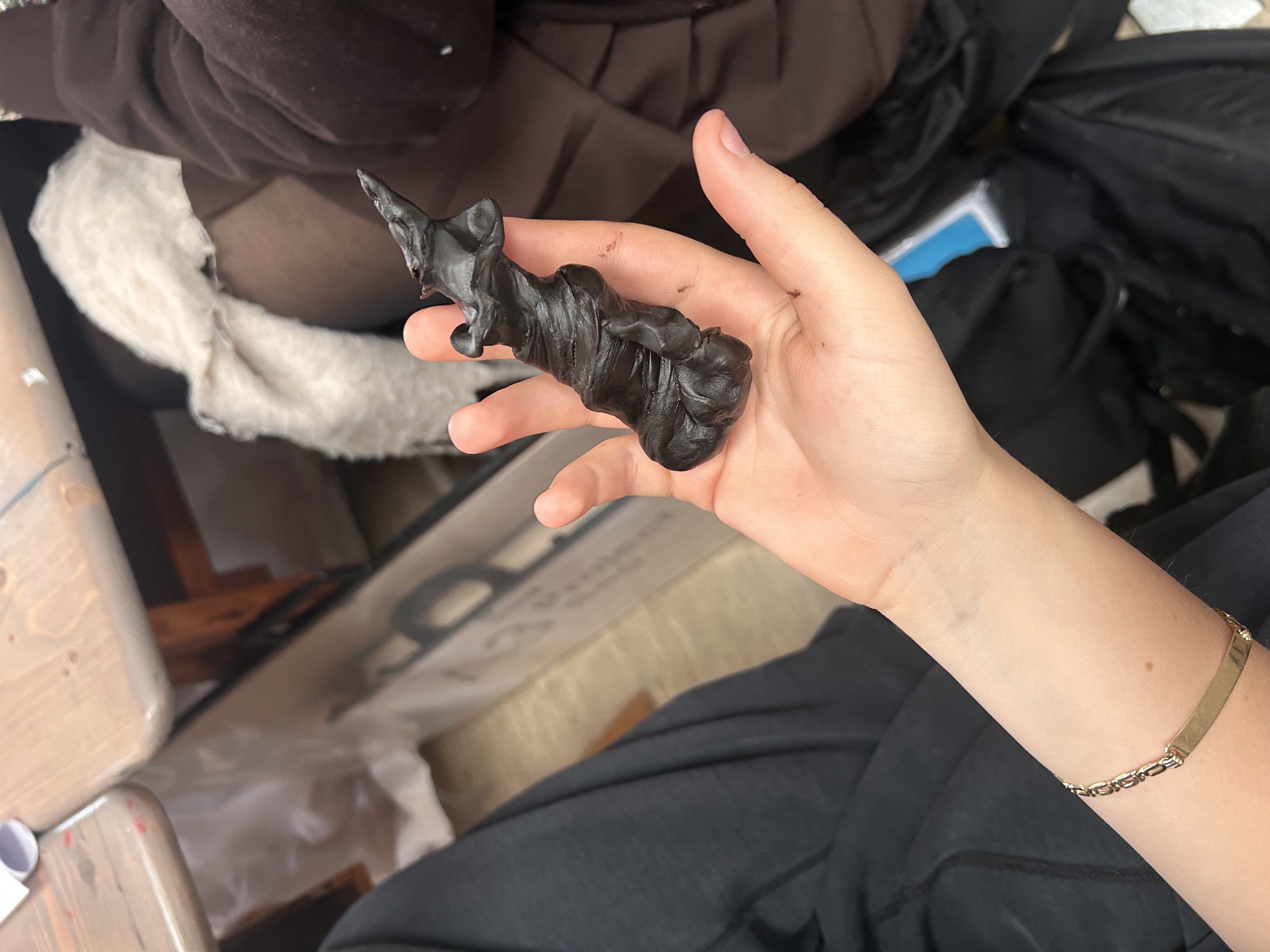 wax sculpture with long, organic form