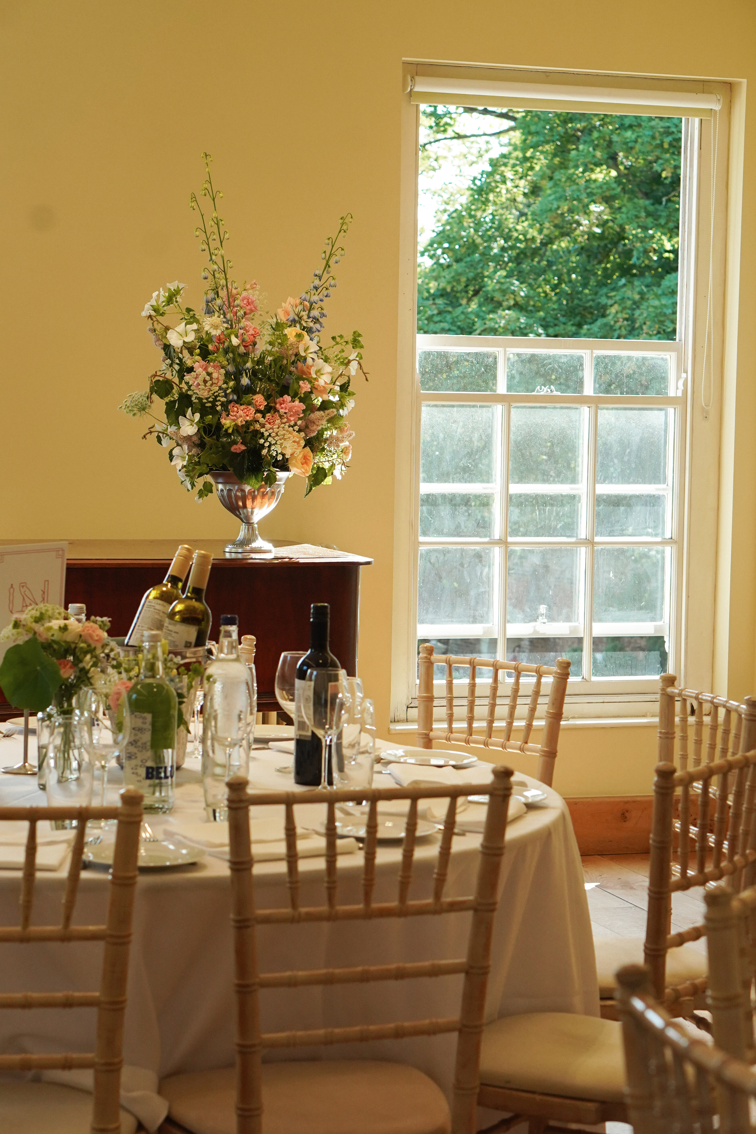 Dinner set-up with round tables in the Long Gallery  Credit: Elvira Azimova