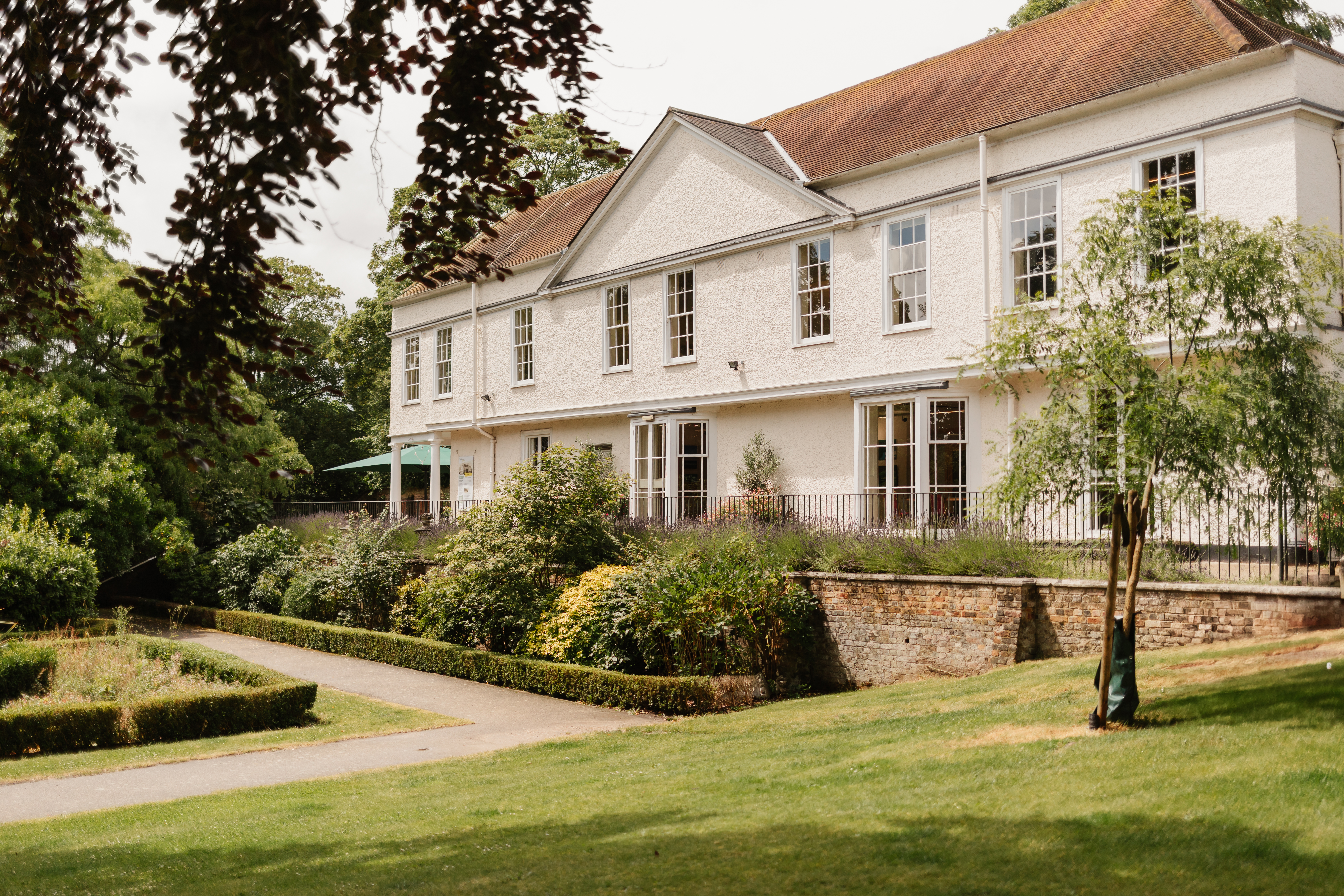 Side view of the House and knot garden  Credit: Claire Wakefield Photography