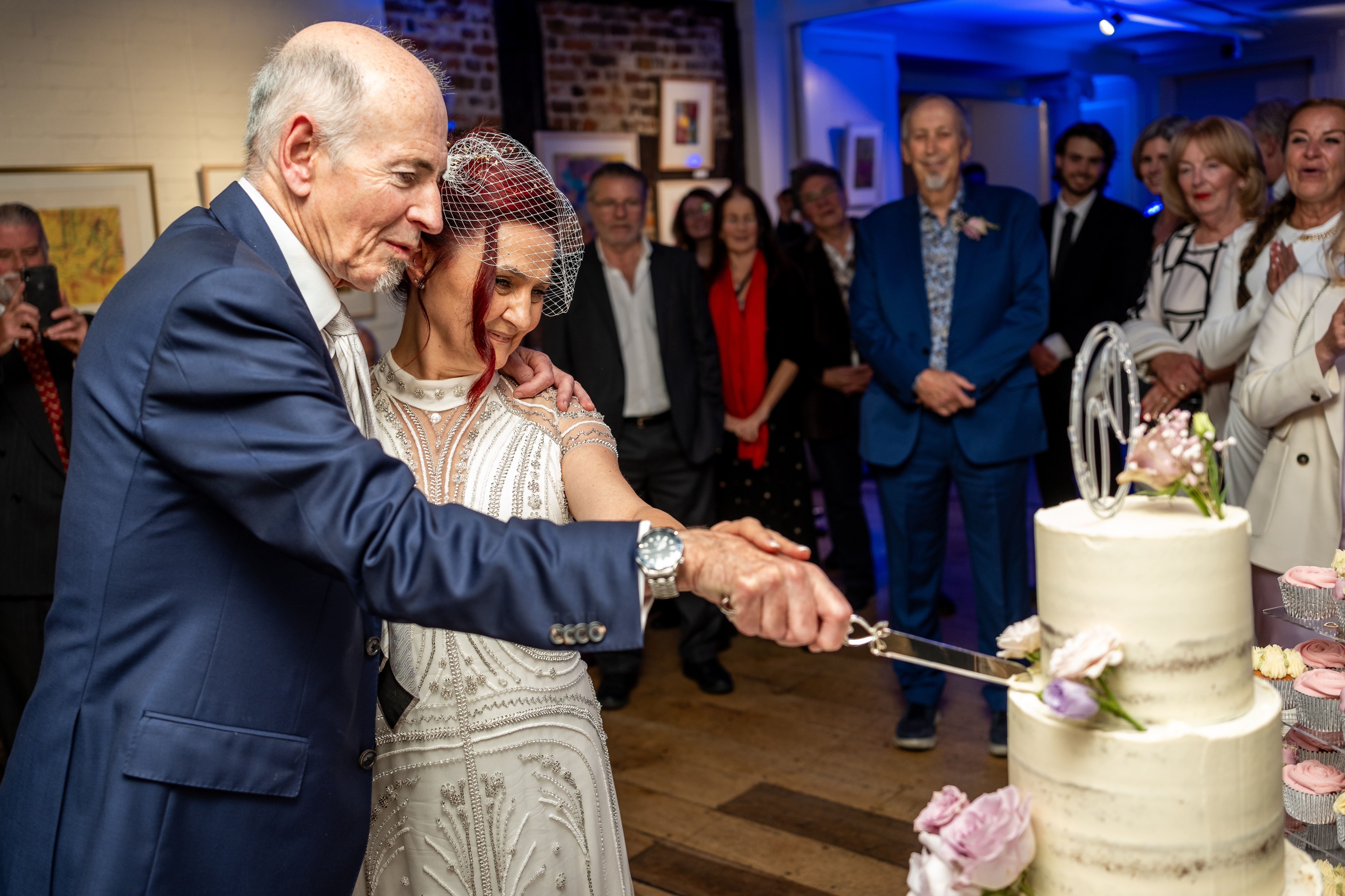 Cutting the cake in the Lower Gallery  Credit: Grae Hood Photography