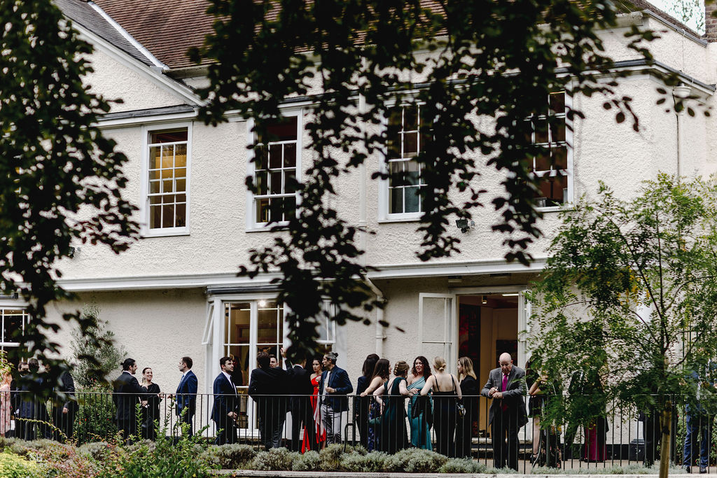 Guests congregating outside Credit Sarah Bruce Photography