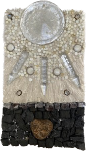 Mosaic with a cream top half and black stone bottom half, with a large grey circle on the top