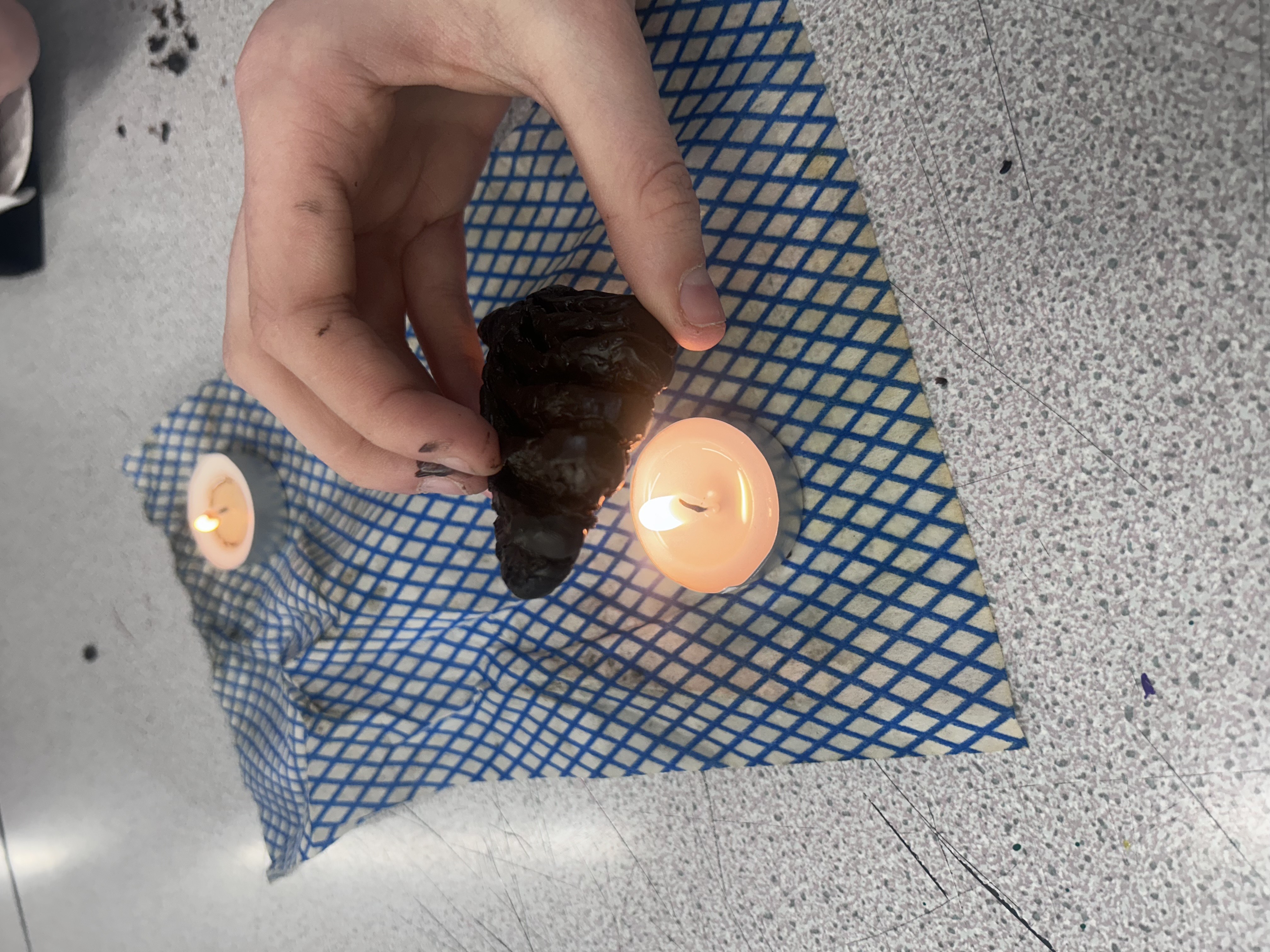 Wax modelling over candle