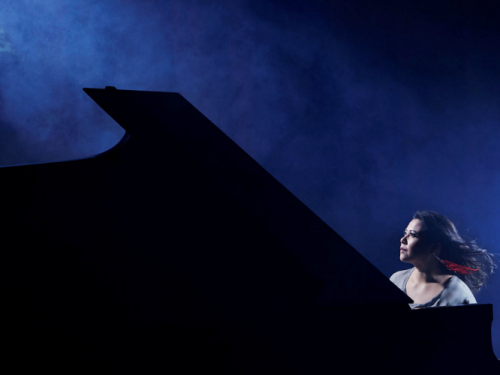 Nikki Yeoh performing and a picture of Lauderdale House at night