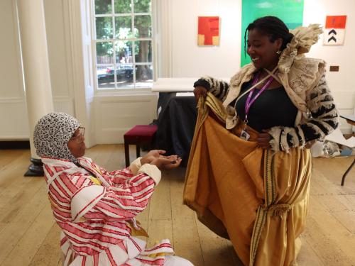 People in Tudor dress inside Lauderdale House