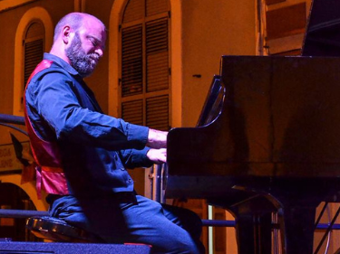 members of the John Crawford Latin Quintet playing together